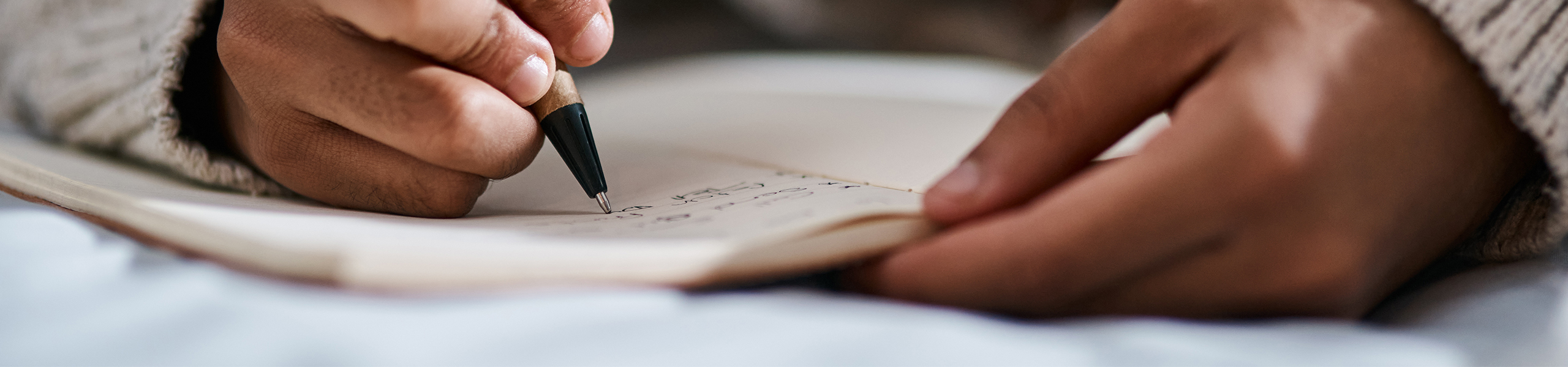 A student taking notes.