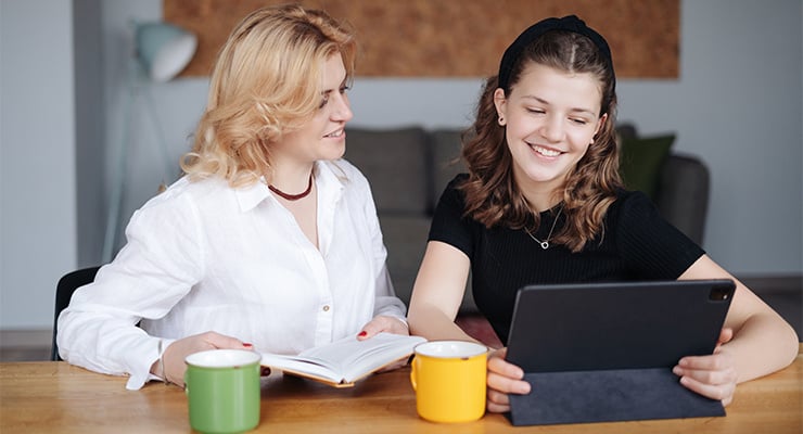 A college counselor helping one of her students.
